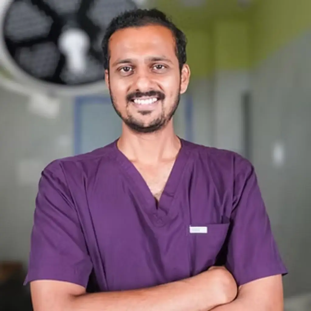 Portrait of Dr. E. Surendranath, dental implantologist and oral and maxillofacial surgeon at YOUR DENTIST Vijayawada, Dental Implants Vijayawada.